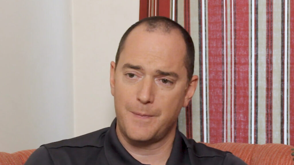 man with short cropped hair