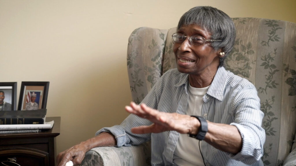 smiling older woman with glasses