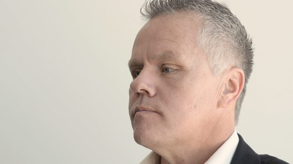 man with short, graying hair