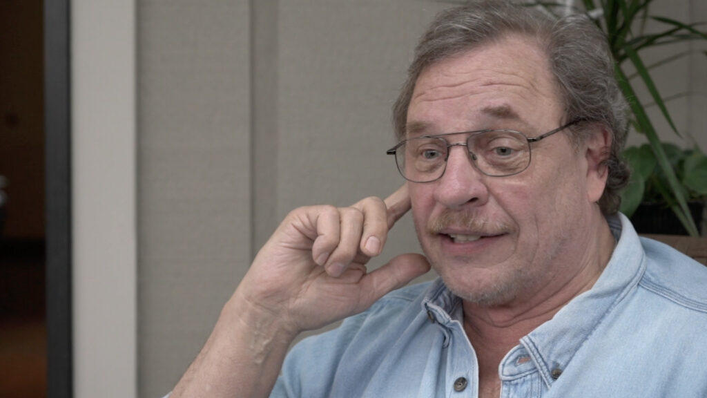 thoughtful man with glasses