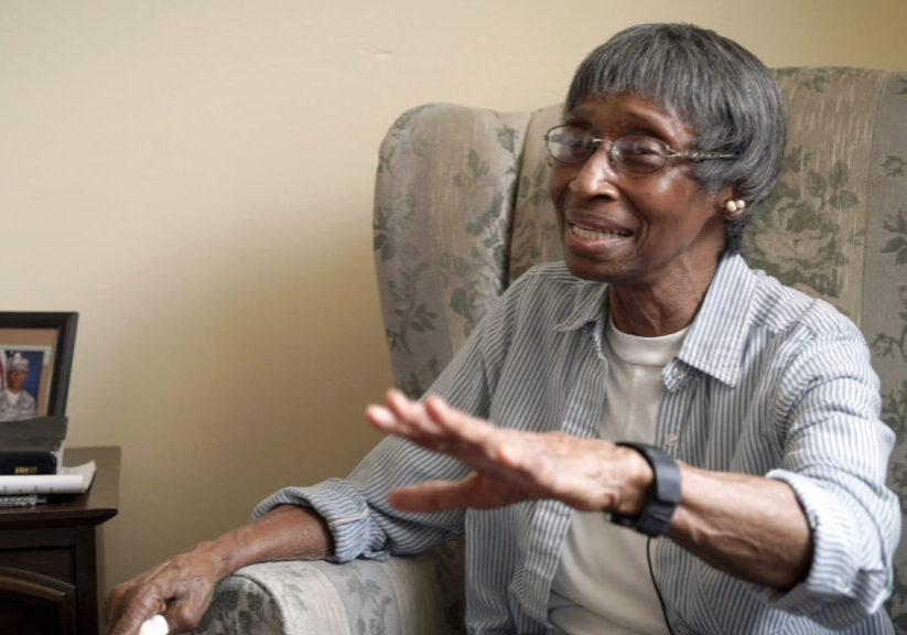Remember-filmstill smiling older woman with glasses