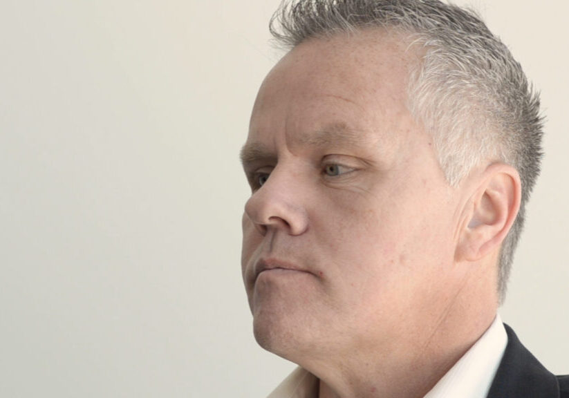 man with short, graying hair